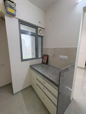 Kitchen in 2 BHK Apartment at Piramal Vaikunth, Balkum Pada – for Rent