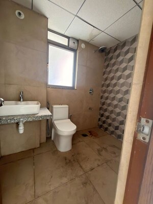 Bathroom in 2 BHK Apartment at Kalpataru Immensa, Kolshet Road – for Rent