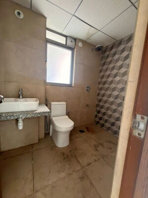 Bathroom in 2 BHK Apartment at Kalpataru Immensa, Kolshet Road – for Rent