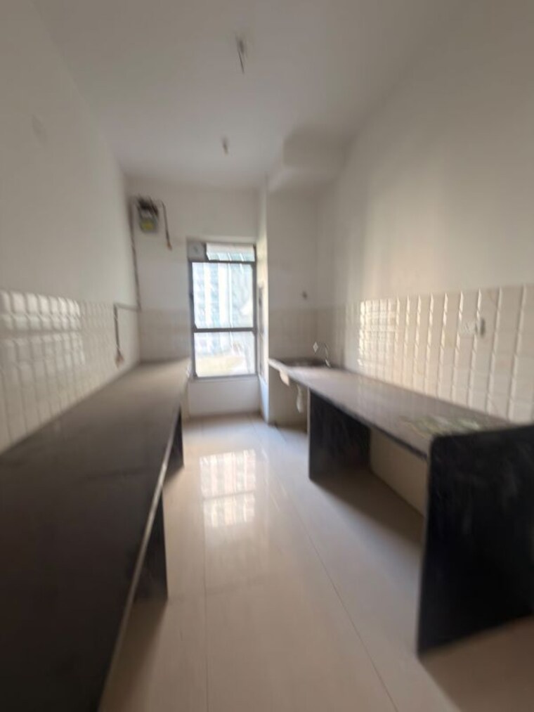 Kitchen, kalpataru-immensa 2 Bedroom 1000 Sq.Ft. Apartment In Kolshet Road Thane 10661167