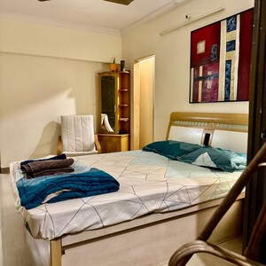 Bedroom in 3 BHK Apartment at Juhu Azad Nagar CHS, Andheri West – for Rent