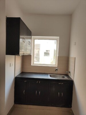 Kitchen in Studio Apartment at Chhatikara – for Sale