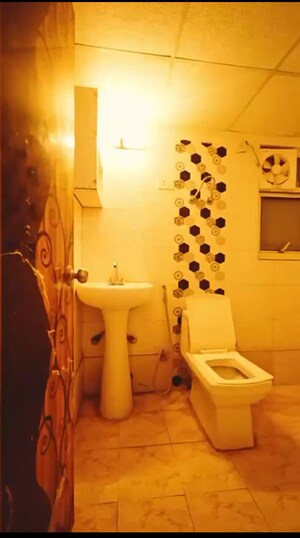 Bathroom in 2 BHK Apartment at Meenal Balmukund Residency, Raj Nagar Extension – for Rent