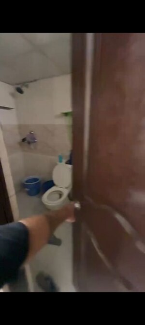 Bathroom in 2 BHK Apartment at Charms Castle, Raj Nagar Extension – for Sale