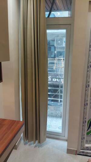 Building Lobby in 3 BHK Builder Floor at Pochanpur Colony – for Sale