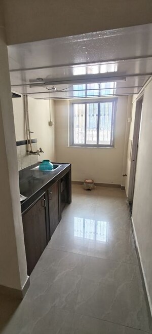 Kitchen in 1 BHK Apartment at Shri Ram Mill, Worli – for Rent