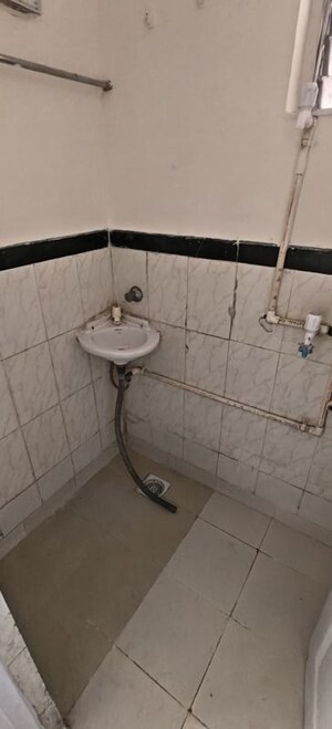 Bathroom in 1 BHK Apartment at Shri Ram Mill, Worli – for Rent