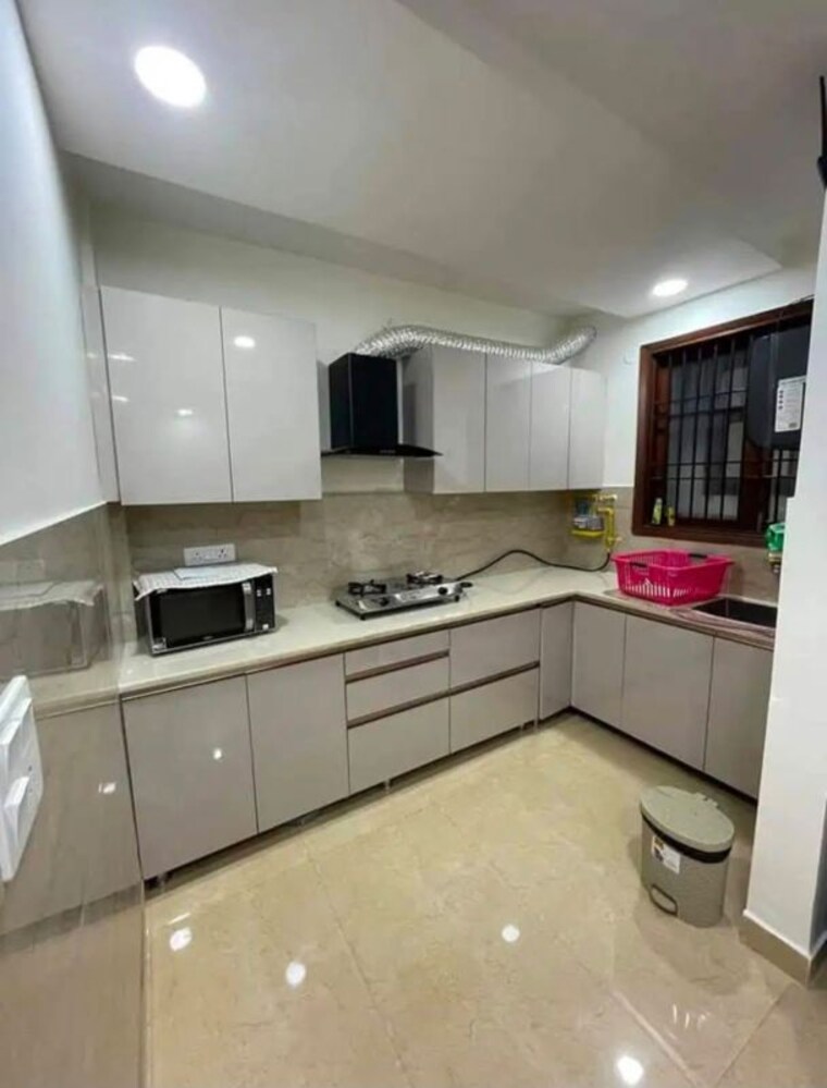 Kitchen, rajouri garden 3 Bedroom 160 Sq.Yd. Builder Floor In Rajouri Garden Delhi 10661409