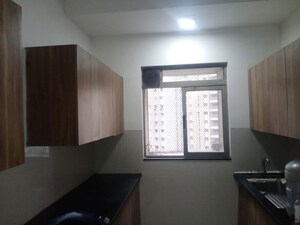 Kitchen in 3 BHK Apartment at Lodha Splendora, Ghodbunder Road – for Sale