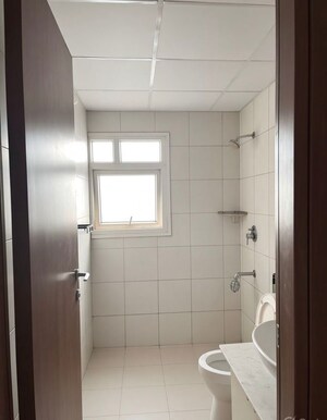 Bathroom in 2 BHK Apartment at Bhartiya Nikoo Homes, Thanisandra Main Road – for Rent