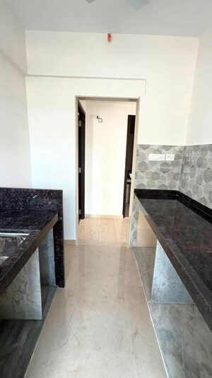 Kitchen in 2 BHK Apartment at Group Satellite Elegance, Goregaon East – for Rent