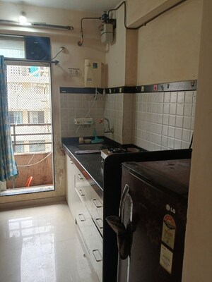 Kitchen in 1 BHK Apartment at Rosa Classique, Kasarvadavali – for Rent