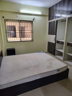 Bedroom in 2 BHK Apartment at Ultimate Signature, Yelahanka – for Rent