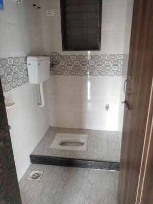 Bathroom in 2 BHK Apartment at Matrix Aayushi Garden, Karanjade – for Rent