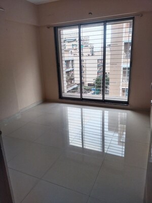 Room in 2 BHK Apartment at Matrix Aayushi Garden, Karanjade – for Rent