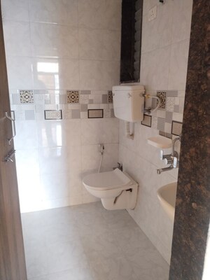 Bathroom in 2 BHK Apartment at Matrix Aayushi Garden, Karanjade – for Rent