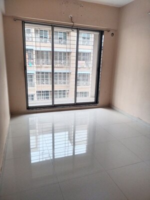Room in 2 BHK Apartment at Matrix Aayushi Garden, Karanjade – for Rent