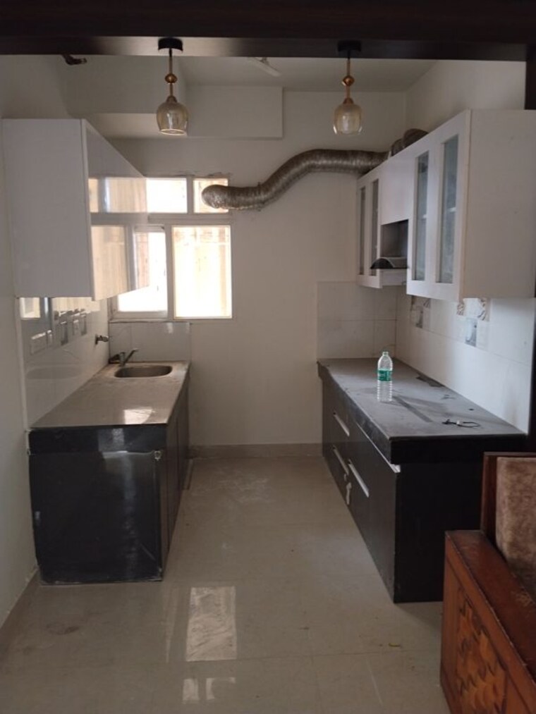 Kitchen, signature-global-the-roselia 2 Bedroom 800 Sq.Ft. Apartment In Sector 95a Gurgaon 10661571