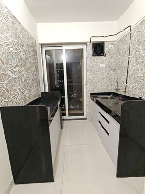 Kitchen in 1 BHK Apartment at Raunak Residency Thane, Pokhran Road No One – for Rent