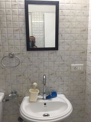 Bathroom in 3.5 BHK Apartment at Gaur City 6th Avenue, Sector 4 Greater Noida – for Rent
