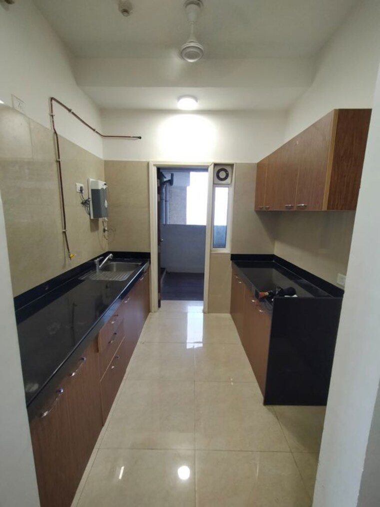 Kitchen, l-t-crescent-bay-t2 2 Bedroom 900 Sq.Ft. Apartment In Parel Mumbai 10661642