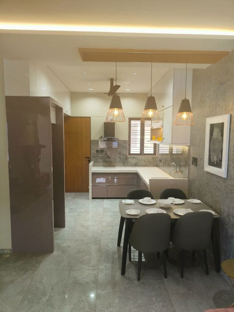 Dining area, sunrise-red-coral-52 4 Bedroom 963 Sq.Ft. Villa In Kendranagar Vadodara 10661666