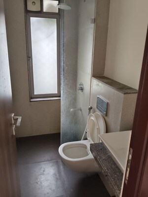 Bathroom in 2 BHK Apartment at Piramal Vaikunth, Balkum Pada – for Rent
