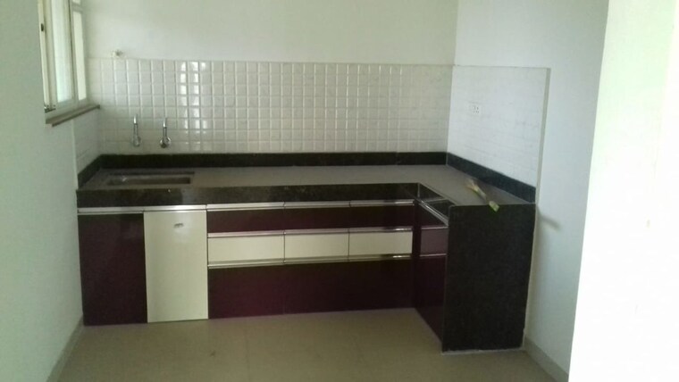Kitchen, amanora-adreno-towers 2 Bedroom 808 Sq.Ft. Apartment In Hadapsar Pune 10661690