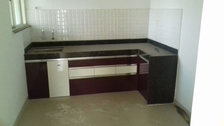 Kitchen, amanora-adreno-towers 2 Bedroom 808 Sq.Ft. Apartment In Hadapsar Pune 10661690