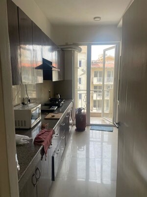 Kitchen in 3.5 BHK Apartment at Smart World Gems, Sector 89 – for Rent