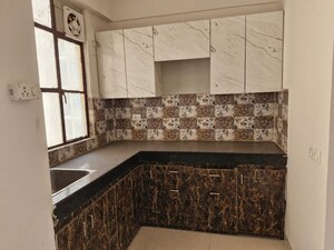 Kitchen in 3.5 BHK Apartment at Smart World Gems, Sector 89 – for Rent