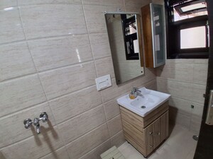 Bathroom in 4 BHK Builder Floor at Rajouri Garden – for Rent