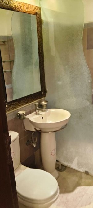 Bathroom in 4 BHK Builder Floor at Safdarjung Enclave – for Sale