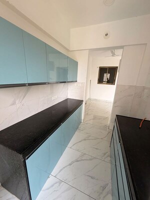 Kitchen in 2 BHK Apartment at Raymond Ten X Habitat, Pokhran Road No Two – for Rent