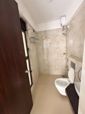 Bathroom in 2 BHK Apartment at Raymond Ten X Habitat, Pokhran Road No Two – for Rent