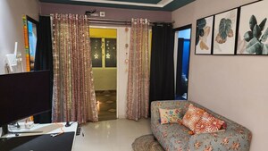 Living Room in 2 BHK Apartment at Gera Emerald City, Kharadi – for Rent
