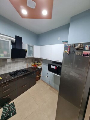 Kitchen in 2 BHK Apartment at Gera Emerald City, Kharadi – for Rent