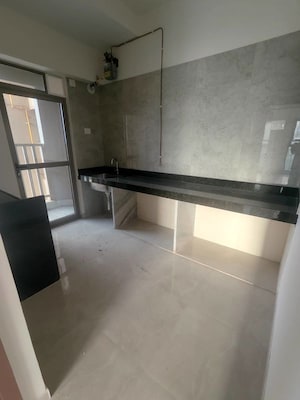 Kitchen in 2 BHK Apartment at Sheth Auris Bliss, Malad West – for Rent