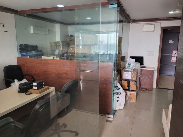 Living Room, rudra-titanium-square Commercial Office Space 777 Sq.Ft. In Sector 26 Ahmedabad 10661305