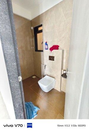 Bathroom in 3 BHK Apartment at Damji Shamji Mahavir Spring Tulip Phase 1, Pokhran Road No Two – for Rent