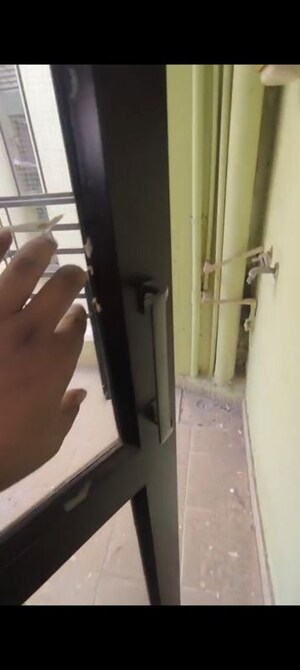 Bathroom in 1 BHK Apartment at Devika Skypers, Raj Nagar Extension – for Rent