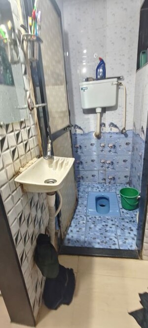 Bathroom in 1 BHK Apartment at Cidco Kargil CHS, Ghansoli – for Rent