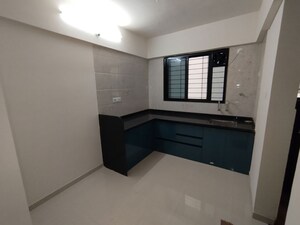 Kitchen in 2 BHK Apartment at Shree Anand Royal Court, Thergaon – for Rent