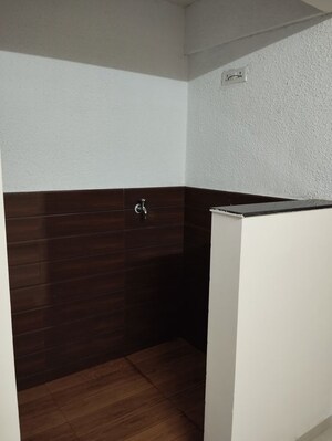 Laundry Area in 2 BHK Apartment at Shree Anand Royal Court, Thergaon – for Rent