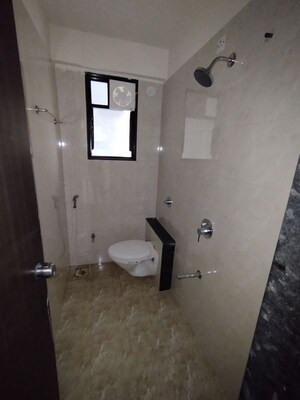 Bathroom in 2 BHK Apartment at Shree Anand Royal Court, Thergaon – for Rent