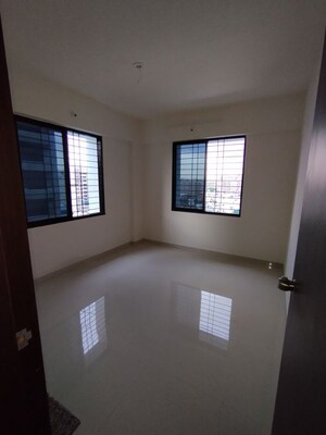 Master Bedroom in 2 BHK Apartment at Shree Anand Royal Court, Thergaon – for Rent
