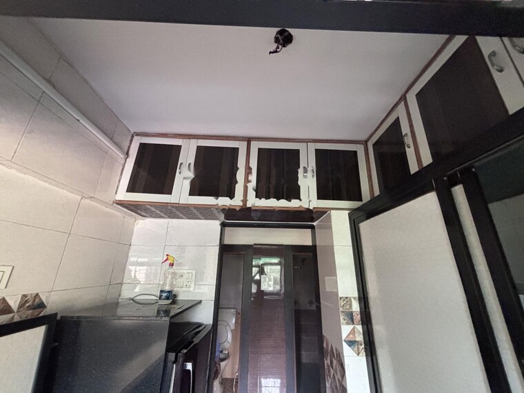 Kitchen, rna-ng-regency-phase-i 1 Bedroom 740 Sq.Ft. Apartment In Balkum Pada Thane 10662108