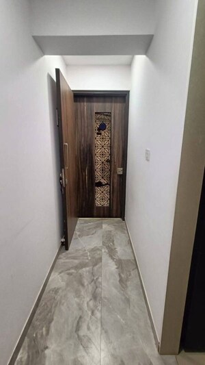 Building Lobby in 2 BHK Apartment at Omkar Ananta, Goregaon East – for Rent