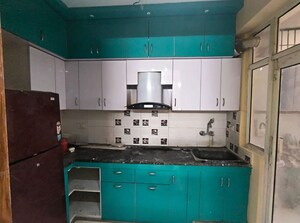 Kitchen in 2 BHK Apartment at Eureka Diya Green City, Raj Nagar Extension – for Rent