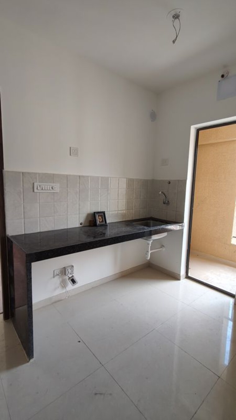 Kitchen, shapoorji-pallonji-joyville-hadapsar-annexe 1 Bedroom 430 Sq.Ft. Apartment In Hadapsar Pune 10662231